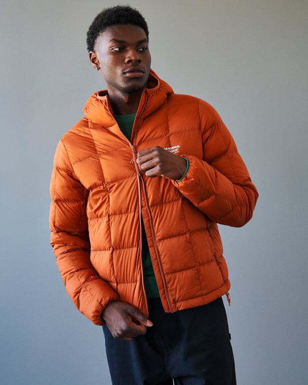 PNS Off-Race Down Jacket Copper Orange - Maats Cycling Culture